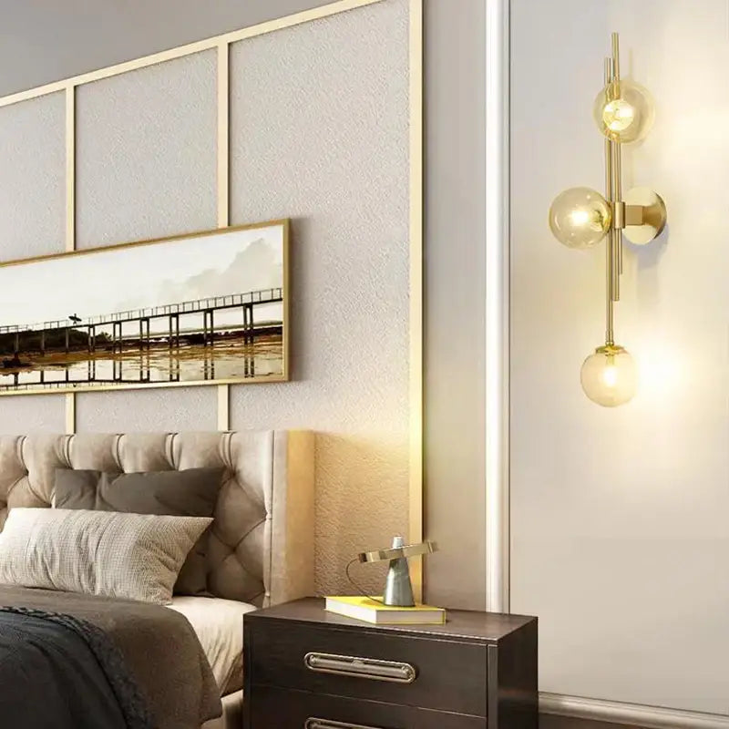 Modern emerald green white glass ball wall lamps featuring a gold-toned three globe vertical wall sconce for decorbites green white decor