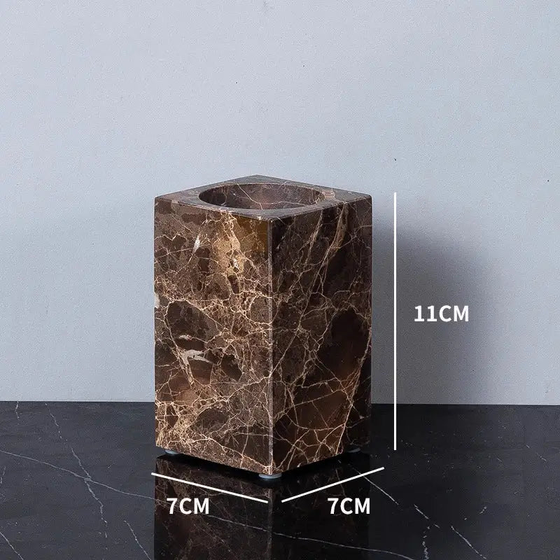 Brown emperador dark marble cube-shaped toothbrush holder with central circular opening from bathroom set