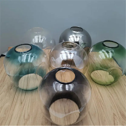 Modern faceted glass shade replacement for living room lamp cover in teal silver and green with black-rimmed openings