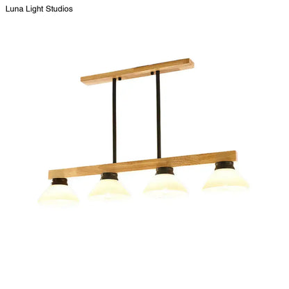 Modern farmhouse style linear pendant light with natural wood frame black metal rods and wooden cone shade frosted glass