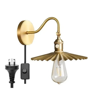 Brass-finished modern fluted decorbites adjustable copper wall sconce with scalloped shade and exposed Edison bulb