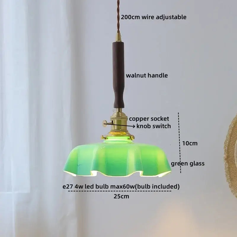 A vintage-style pendant light with green glass shade, walnut handle, and copper socket for decorbites led walnut copper