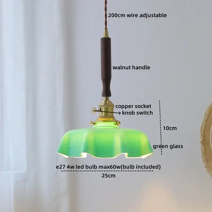 A vintage-style pendant light with green glass shade, walnut handle, and copper socket for decorbites led walnut copper