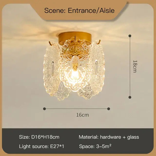 Modern french gold and clear glass led chandelier featuring an ornate gold base with decorbites clear glass shades for living room decor