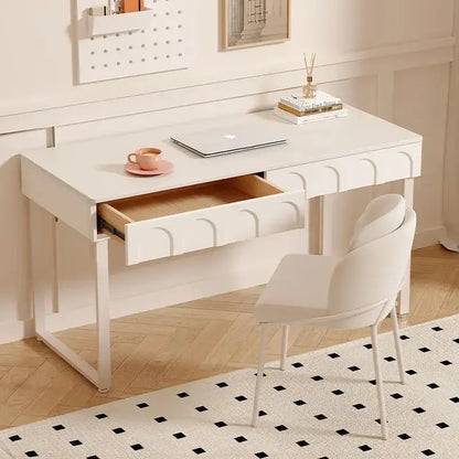 White rock board desk with single arched drawer and light wood interior paired with cream wind rock chair decorbites cream wind