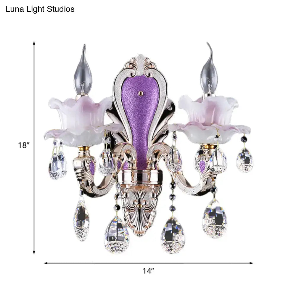 Elegant frosted glass purple wall sconce with teardrop crystal droplets and floral shades for modern bedroom decor