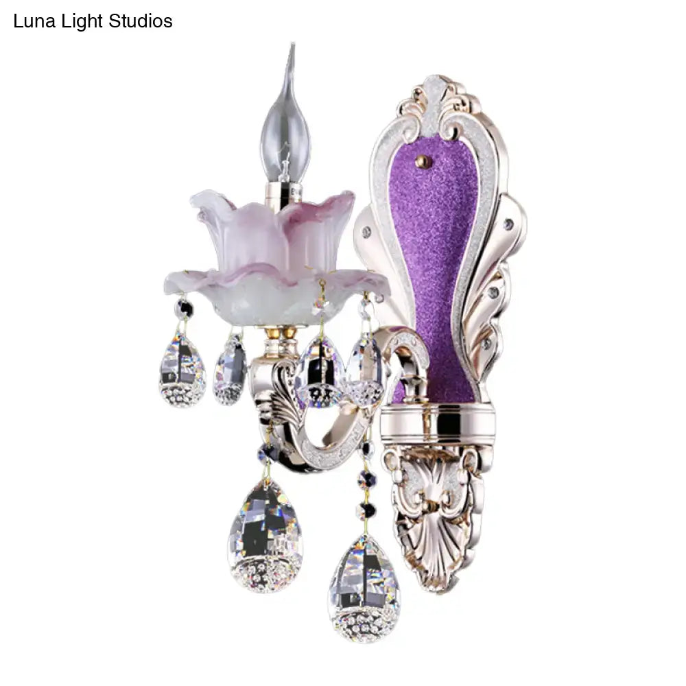 Elegant modern frosted glass purple wall sconce with teardrop crystal pendants and frosted lavender flower shade for bedroom