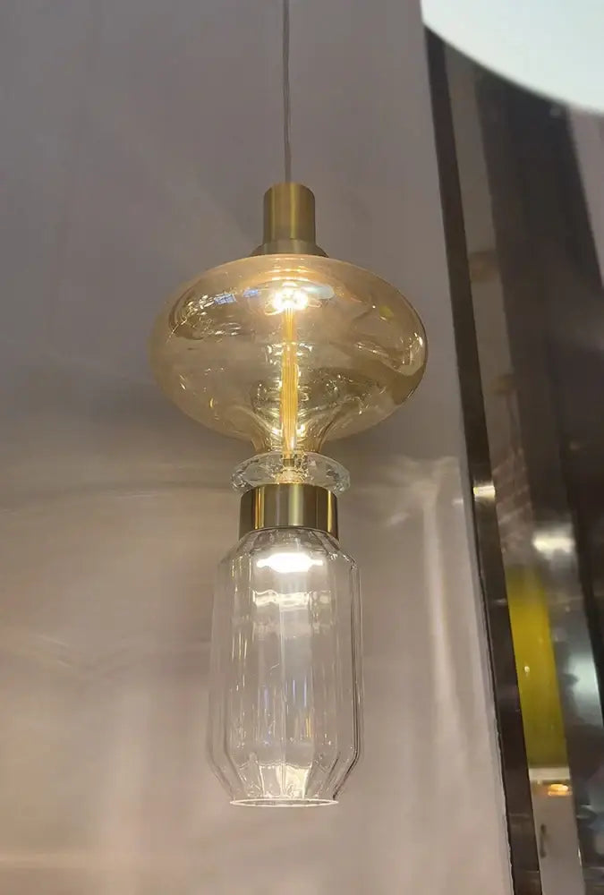 Modern geometric amber and clear glass chandelier featuring a gold-toned top, perfect glass chandelier for dining rooms decorbites glass chandelier