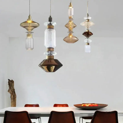 Modern geometric amber and clear glass chandelier with brass accents featuring stacked shapes for dining room decorbites glass chandelier