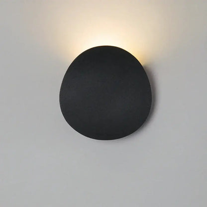 Modern geometric black matte led wall light with soft warm glow for living room decorbites led wall sconce