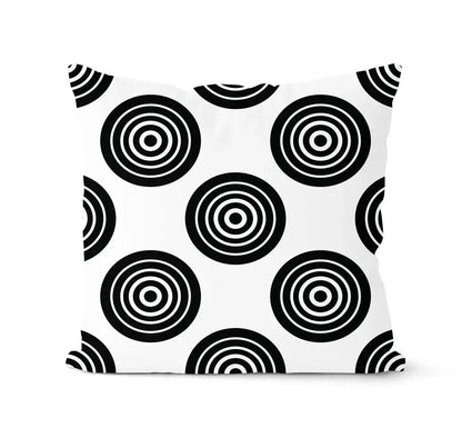 White throw pillow with bold black concentric circle pattern from decorbites geometric black white pillowcase set