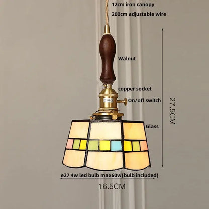 Vintage-style pendant light with blue glass geometric panels brass hardware and walnut wooden handle for dining decorbites blue glass