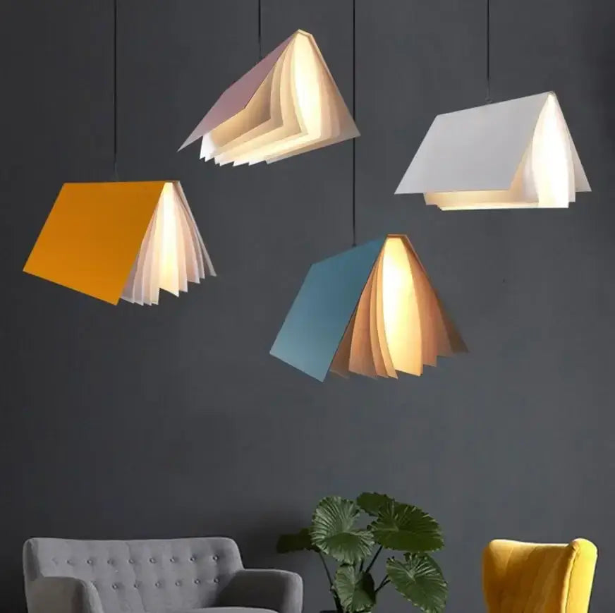 Colorful modern geometric book pendant lamp with layered paper-like pages and warm interior lighting for bedroom decorbites book pendant