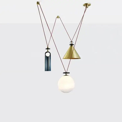 Modern geometric brass and black glass pendant light with three adjustable shape led shades for dining room use