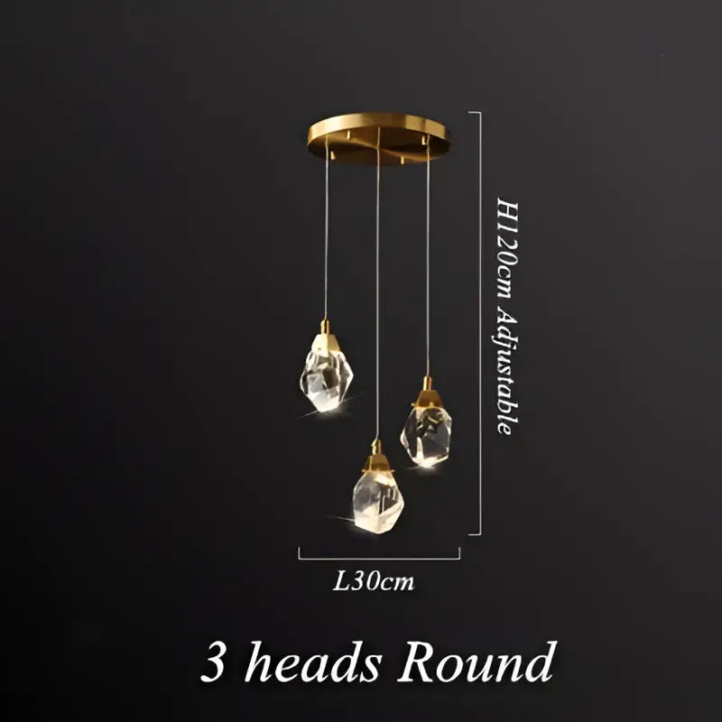 Gold-toned modern geometric brass pendant light with three dangling crystal droplets diamond crystal led chandelier