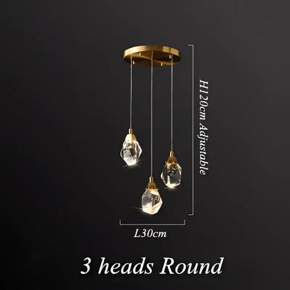 Gold-toned modern geometric brass pendant light with three dangling crystal droplets diamond crystal led chandelier