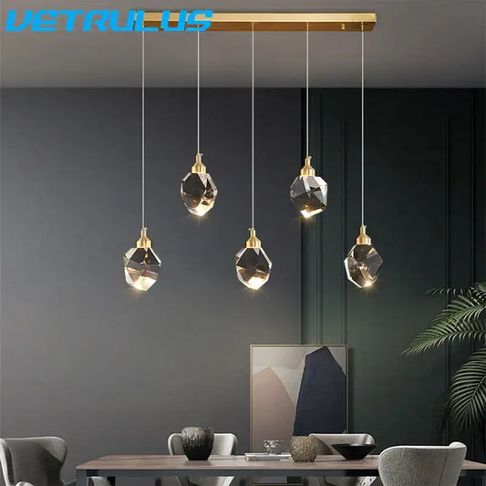 Modern geometric brass diamond crystal led chandelier featuring gold-toned pendant light with minimalist design