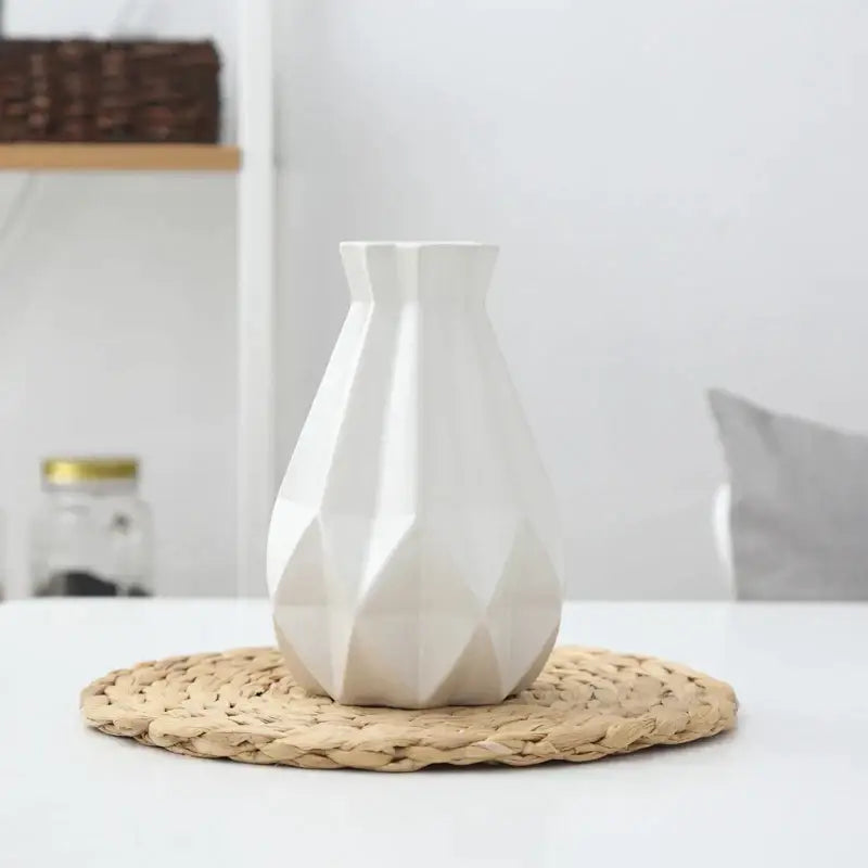 White ceramic diamond vase with geometric faceted design by decorbites ceramic for modern living room decor