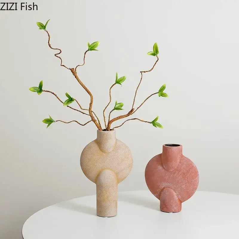 Modern geometric ceramic vase set of 4 in beige and dusty rose with sculptural shapes for living room decorbites geometric decor