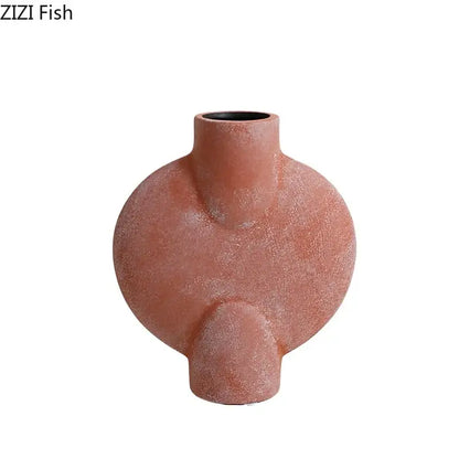 Terracotta-colored decorbites geometric ceramic vase with textured matte finish and asymmetrical organic shape for living room decor