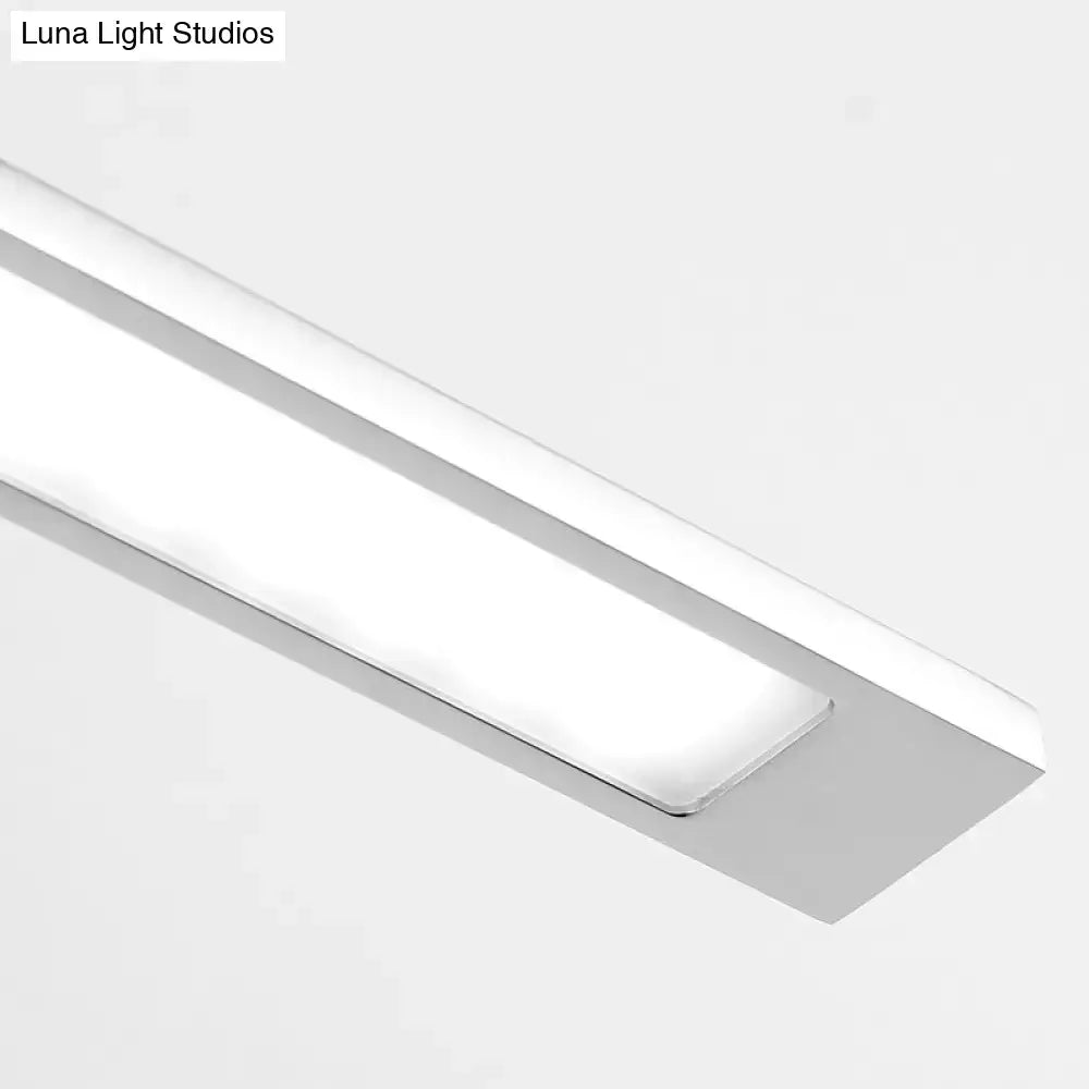 Modern geometric chrome vanity light fixture with sleek silver aluminum housing and diffused white LED vanity light