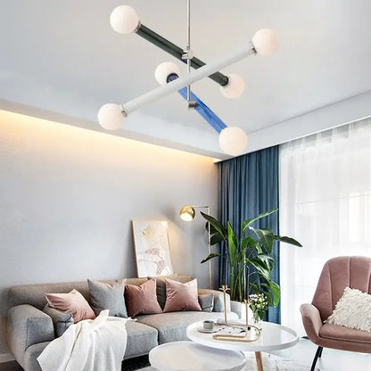 Modern geometric colorful chandelier with white spherical bulbs and black blue silver metallic arms for dining room decorbites colorful chandelier chandelier art deco
