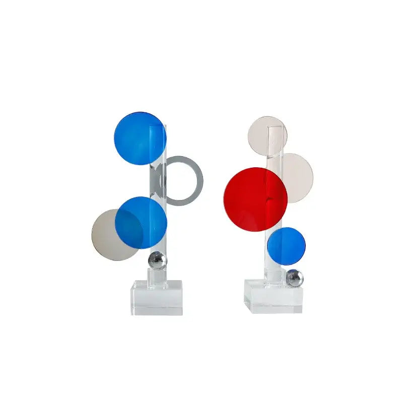 Modern geometric crystal circle sculpture featuring transparent acrylic rods with blue red discs for home decor by decorbites