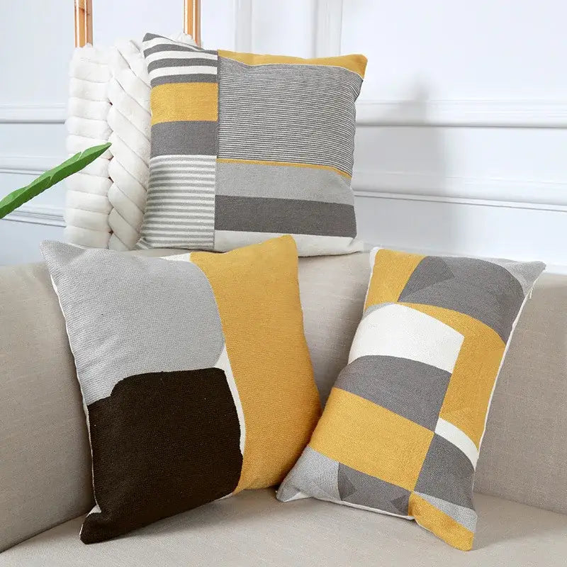 Modern geometric embroidery pillow cover in mustard yellow gray and white with textured fabric for living room decorbites