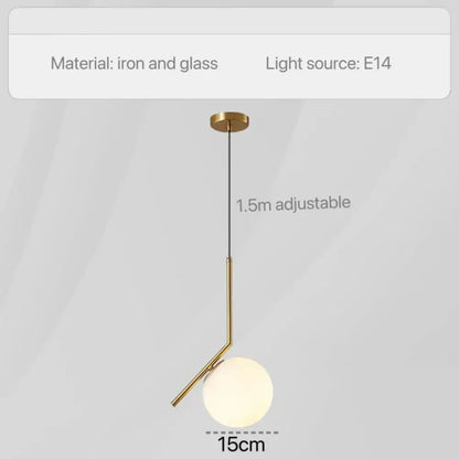 Modern geometric glass pendant lights with brass-finished iron and frosted glass shade for bedroom bedside use