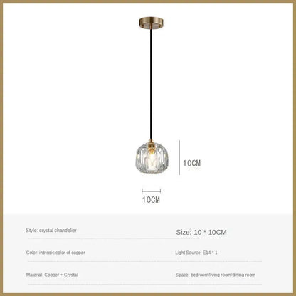 A delicate crystal led pendant light with copper finish and faceted glass globe for modern dining room decorbites