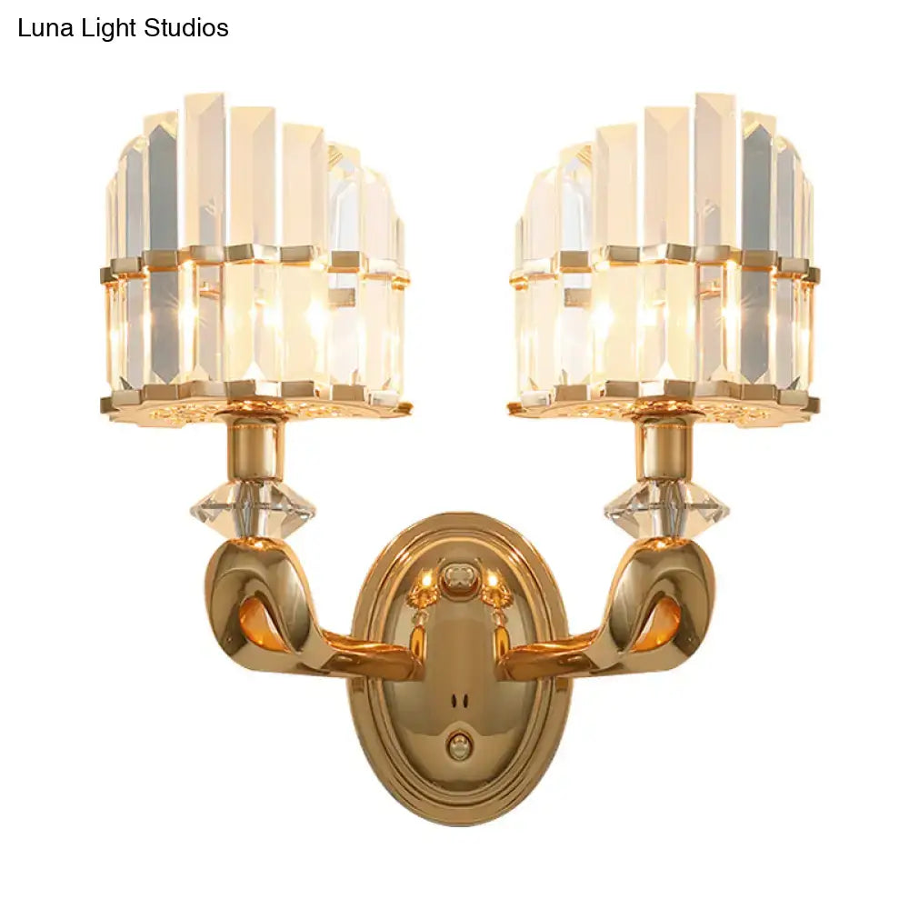 Modern geometric gold wall lamp with two crystal-encrusted vertically segmented lampshades for living room use