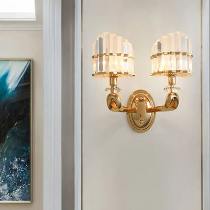 Gold-toned modern geometric wall lamp with two crystal-encrusted light fixtures for living room sconce lighting