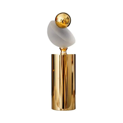 Modern geometric golden ball frosted glass sculpture with golden cylindrical base for living room decor