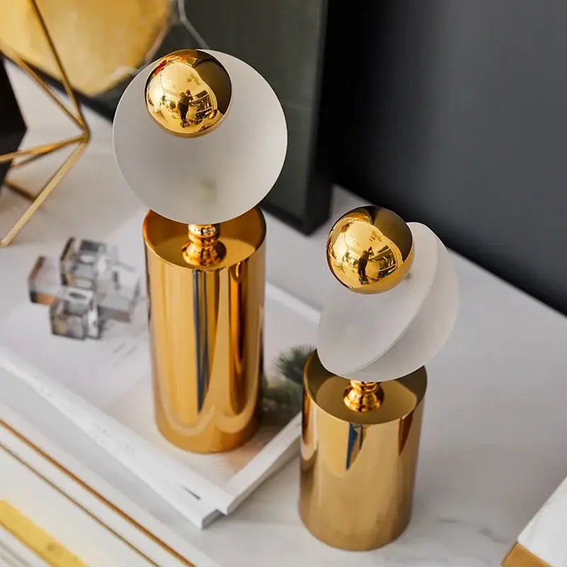 Modern geometric golden ball frosted glass sculpture with gold and white spheres on polished metallic bases for living room decor
