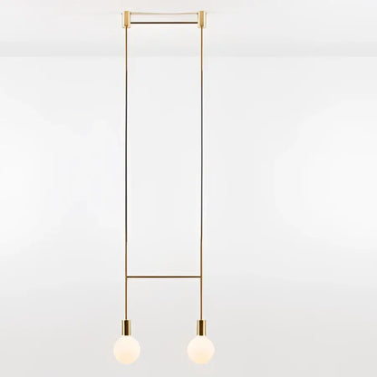 Modern geometric iron pendant light with brass frame and frosted glass bulbs for dining room decorbites geometric iron pendant