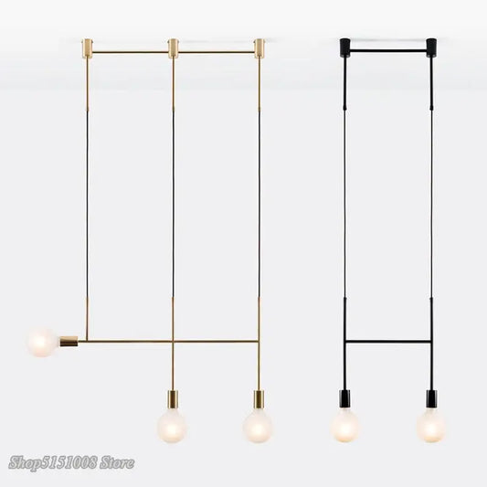 Modern geometric iron pendant light in brass and black with three exposed bulbs for dining room decorbites geometric iron pendant