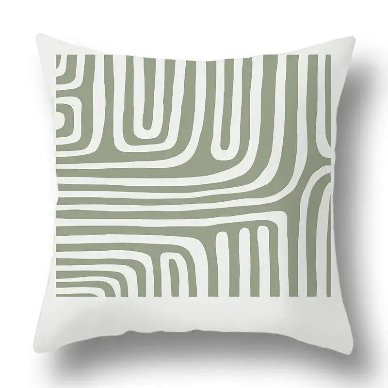 A modern geometric print pillow cover with flowing olive green lines on soft textured fabric for living room decorbites green plants