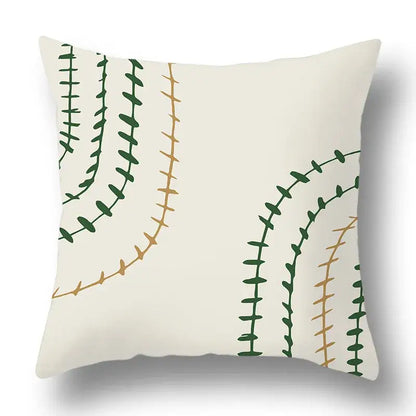 Cream-colored pillow cover with modern geometric print of green and tan stitched vines for decorbites green plants set