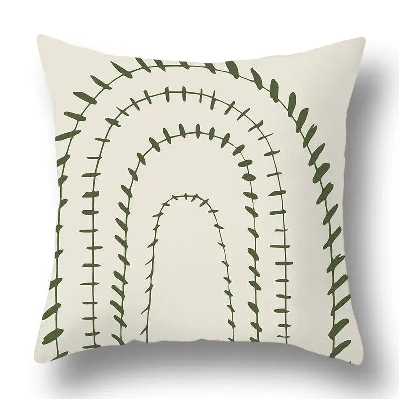 Cream-colored pillow cover with geometric print of dark green leafy vines by decorbites green plants for living room decor