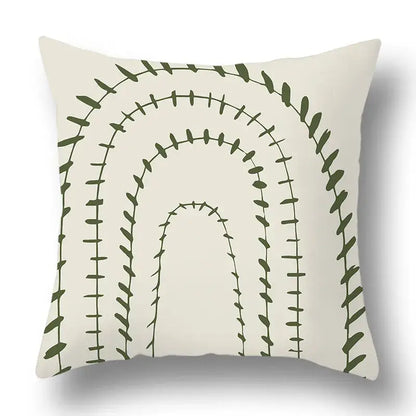 Cream-colored pillow cover with geometric print of dark green leafy vines by decorbites green plants for living room decor