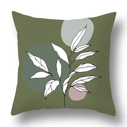 Olive green pillow cover with minimalist white leaf and abstract geometric print by decorbites green plants for living room decor