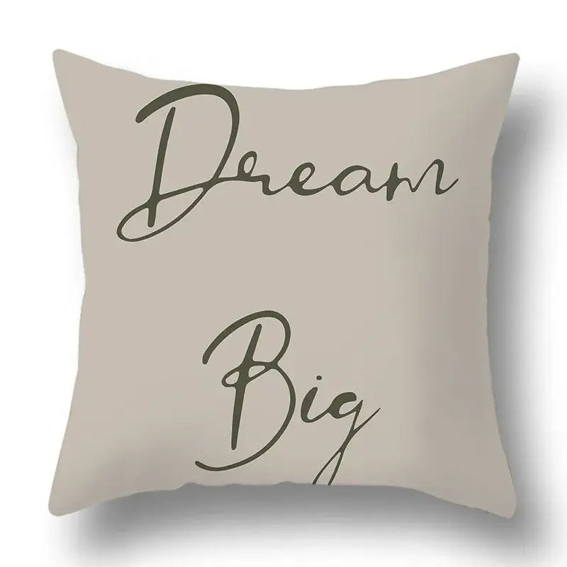 Beige square pillow cover with dream big in dark green cursive for modern geometric print decorbites green plants set