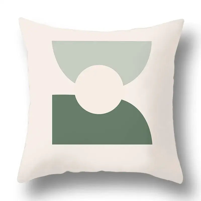 Cream-colored pillow cover with geometric print in muted sage and olive green for decorbites green plants living room pack