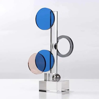 Modern geometric ring acrylic sculpture with translucent blue and rose gold discs on clear crystal base for home decor by decorbites crystal geometric