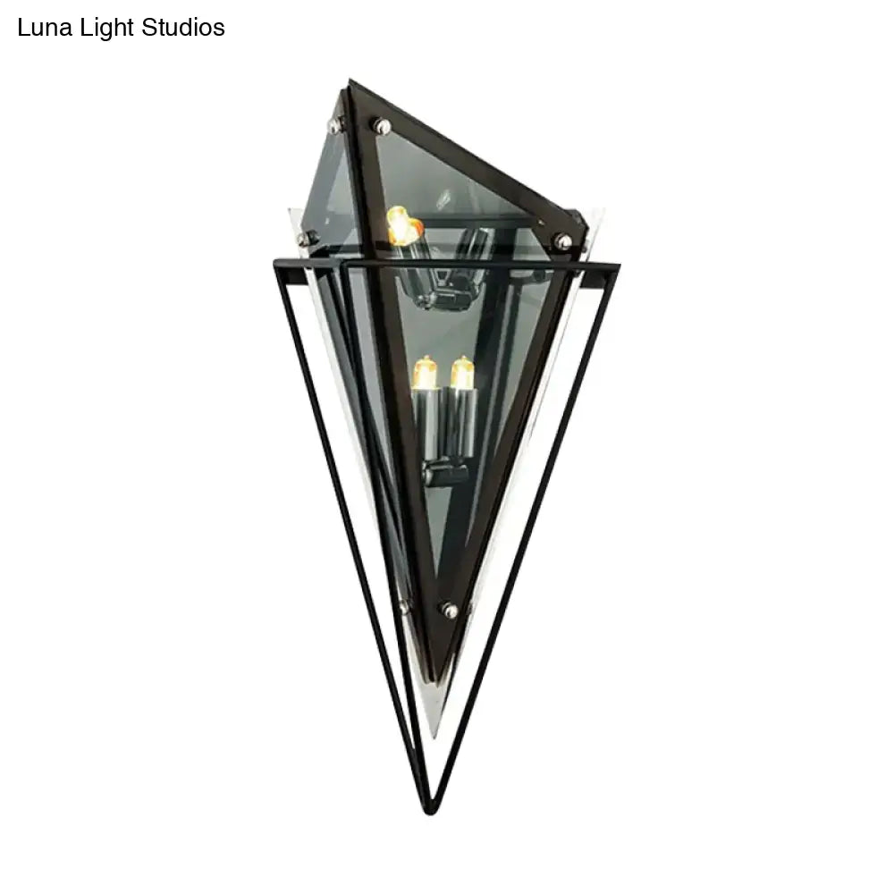 Modern geometric smoke gray led wall lamp with black metal and glass design featuring three exposed filament bulbs