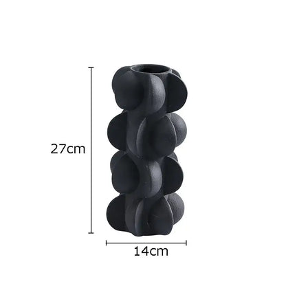 Black ceramic geometric spiral vase with textured rounded protrusions for modern living room decorbites decor