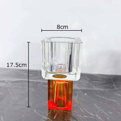 Clear faceted acrylic vase with vibrant orange base and gold accent on square platform for decorbites geometric square artificial flowers decor