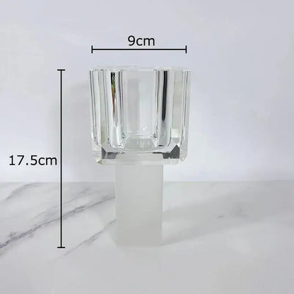 Clear faceted crystal candle holder with frosted glass base complements decorbites geometric square artificial flowers decor