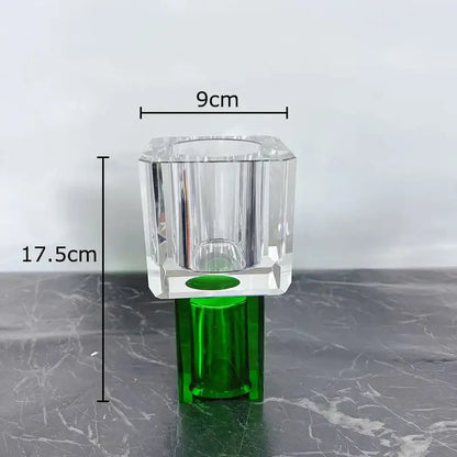 Clear faceted crystal vase with green base complementing modern geometric square artificial flowers decorbites decor