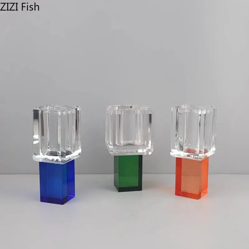 Three translucent crystal candle holders with geometric square acrylic bases in blue orange for decorbites artificial flowers decor